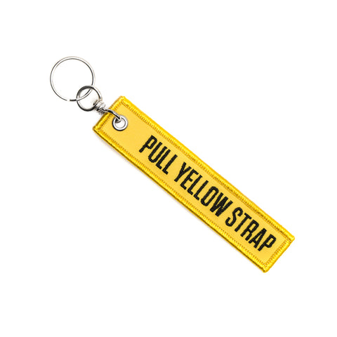 Pull The Yellow Strap Keychain